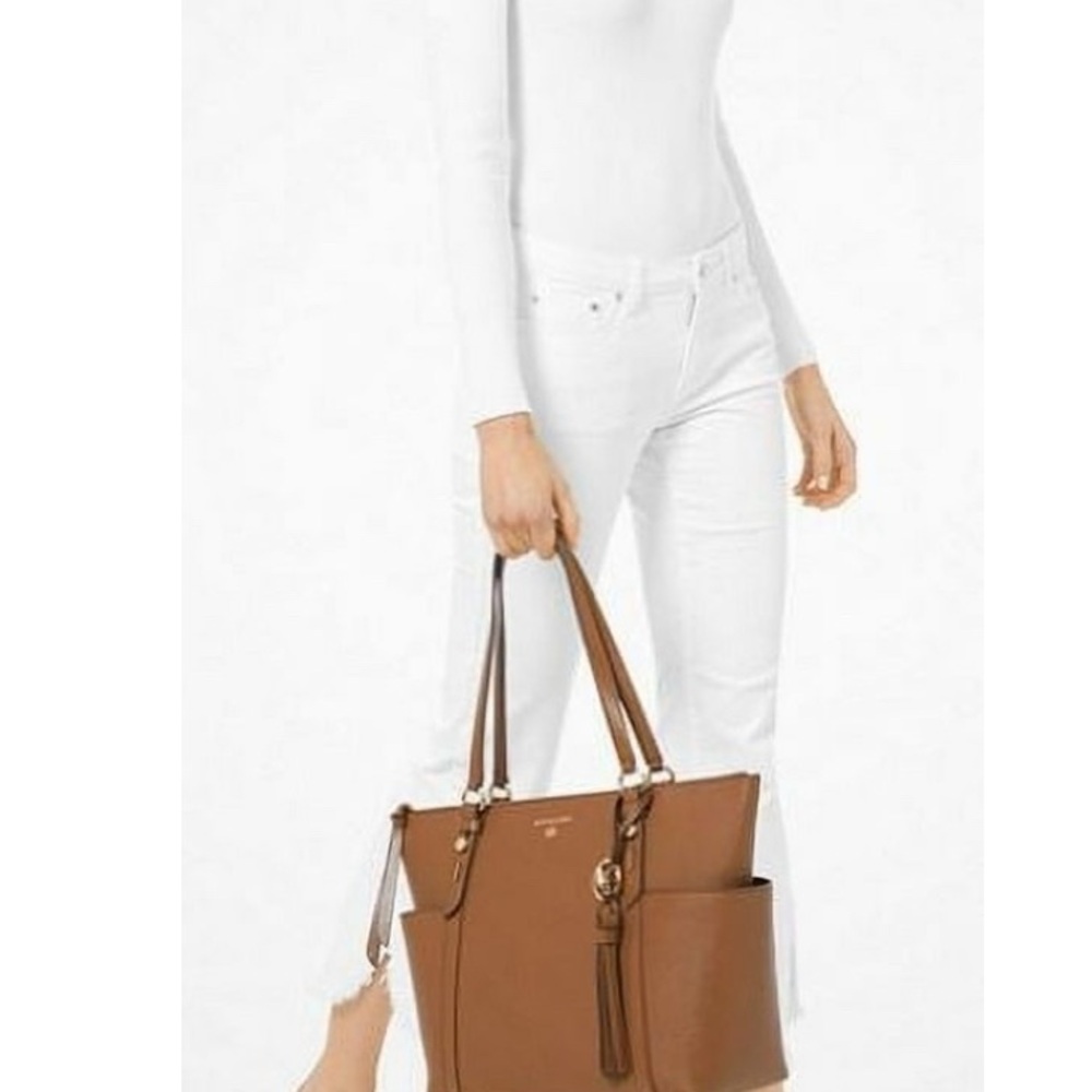 Michael Kors Authentic Camal/Tan Tote Good Size Pockets on Each End Never Used